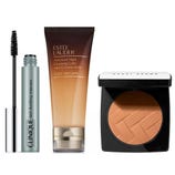 Clinique Lash Doubling Mascara, Estée Lauder Advanced Night Cleansing Gelée with 15 Amino Acids, and Bobbi Brown bronzing powder in a compact case.