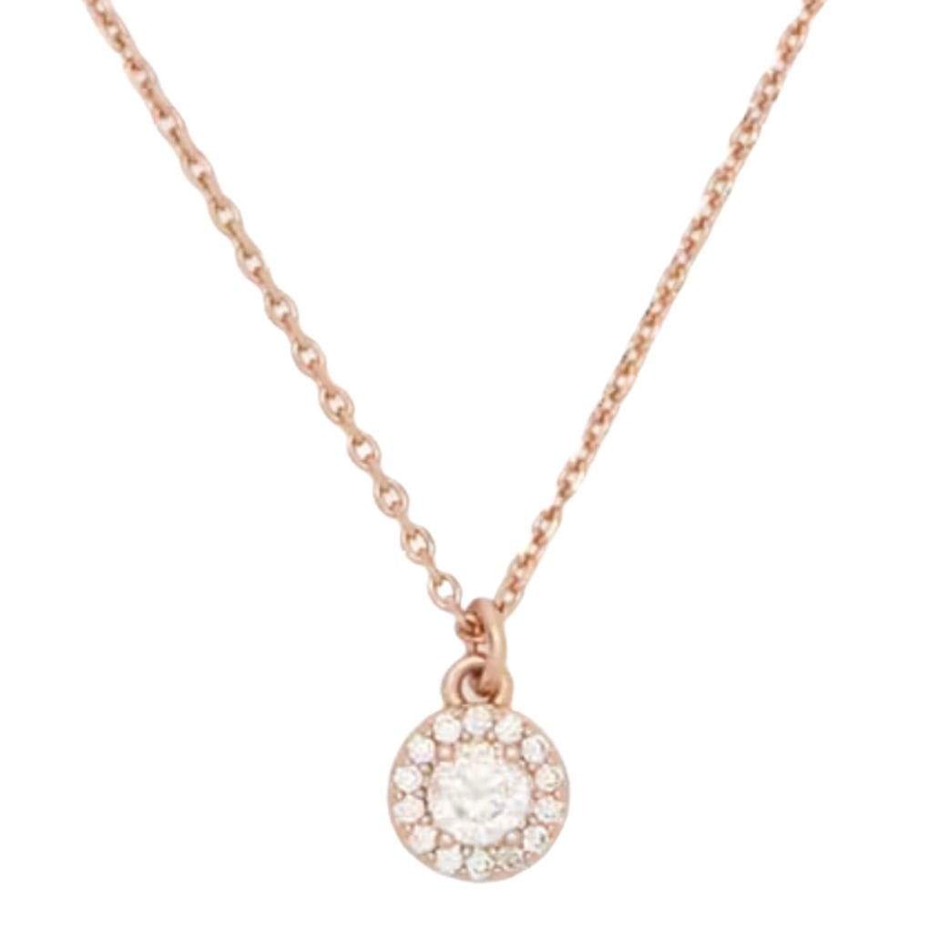 A rose gold necklace with a small round pendant featuring a central clear stone surrounded by smaller stones.