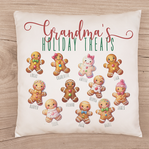A pillow cover with \“Grandma's Holiday Treats\“ text and illustrations of various decorated gingerbread people.