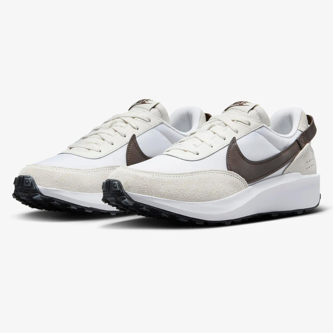 A pair of white and brown sneakers with a classic design and black soles.