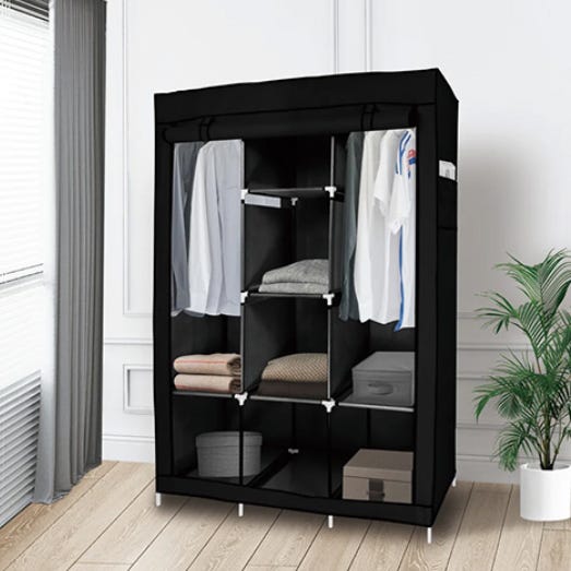 Black portable wardrobe with shelves and hanging space, containing clothes and storage boxes.