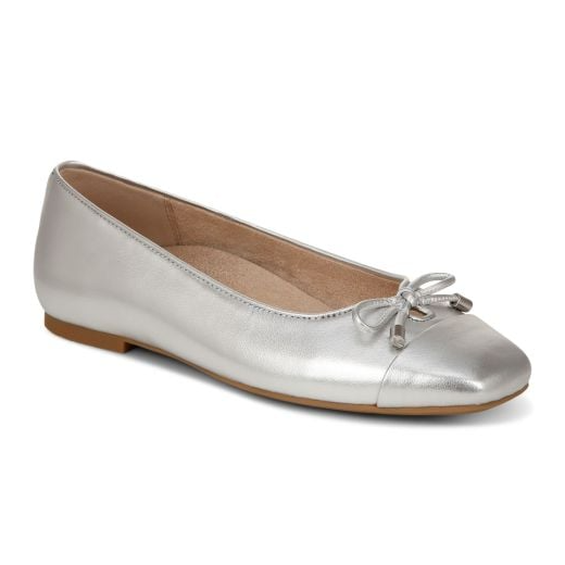 Silver ballet flats from Vionic featuring a smooth leather finish, a decorative bow on the rounded toe, and a low heel for comfort.