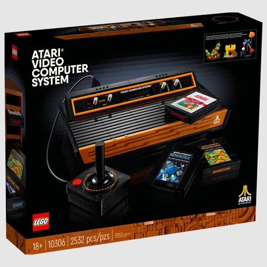 LEGO model of the Atari Video Computer System with a joystick and game cartridges. Suitable for ages 18+, set number 10306, 2532 pieces.