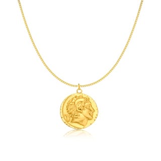 Gold necklace with a circular pendant featuring a classical profile relief design.