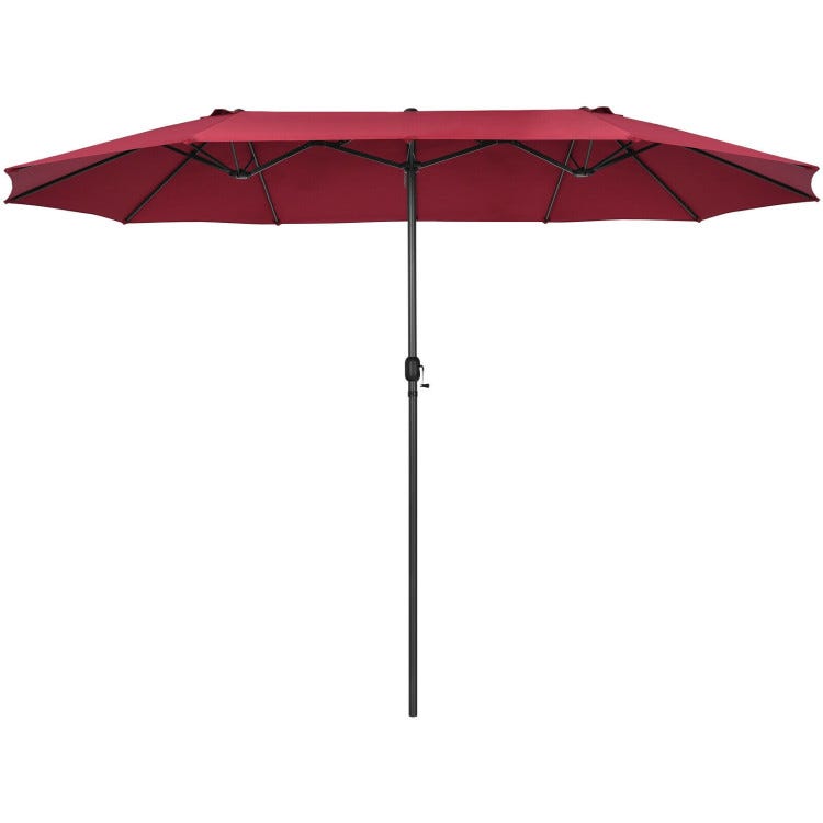 A red rectangular outdoor patio umbrella with a central black pole and a crank handle for easy adjustment.
