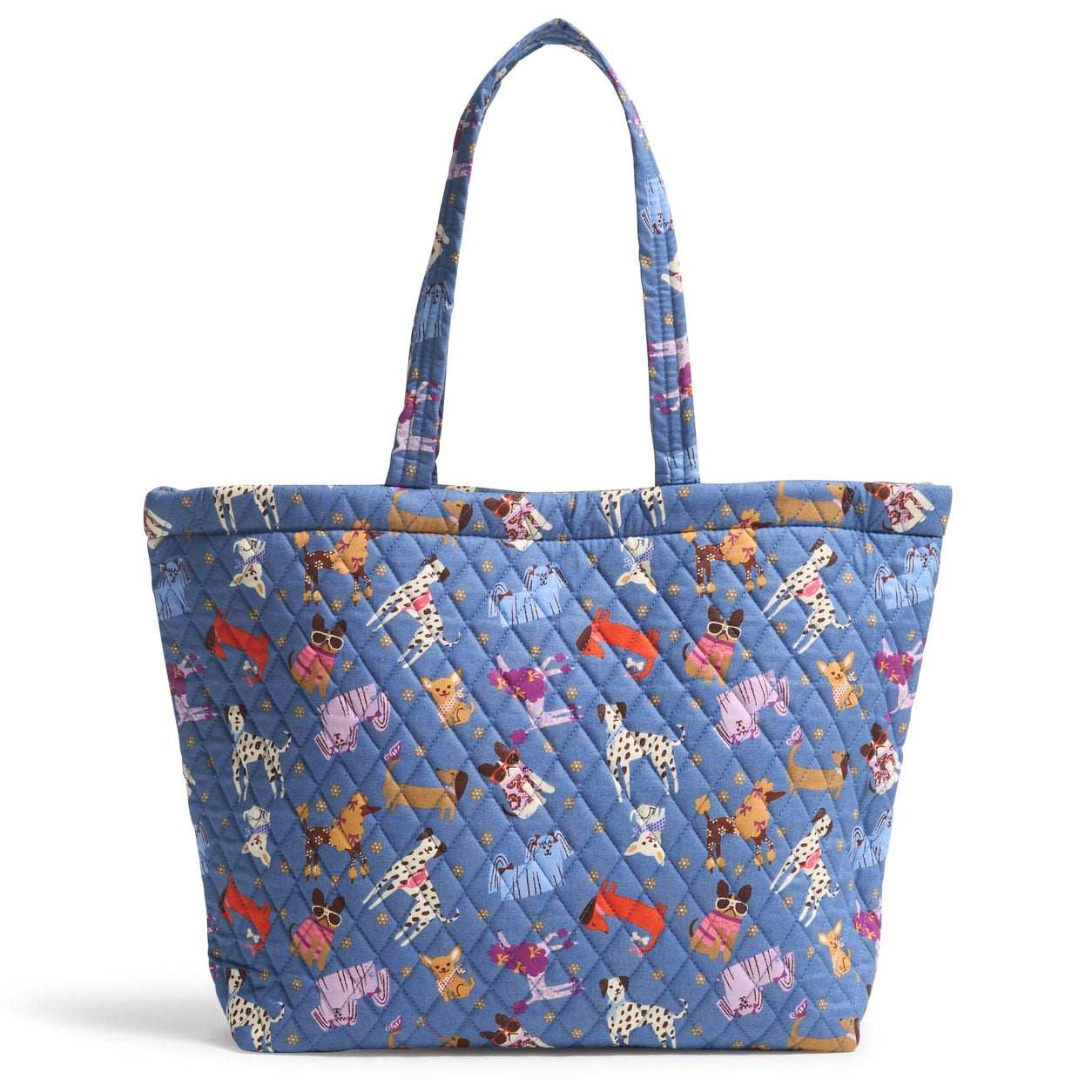 A blue quilted tote with a whimsical pattern featuring various dogs wearing clothes and accessories, complemented by two sturdy shoulder straps.