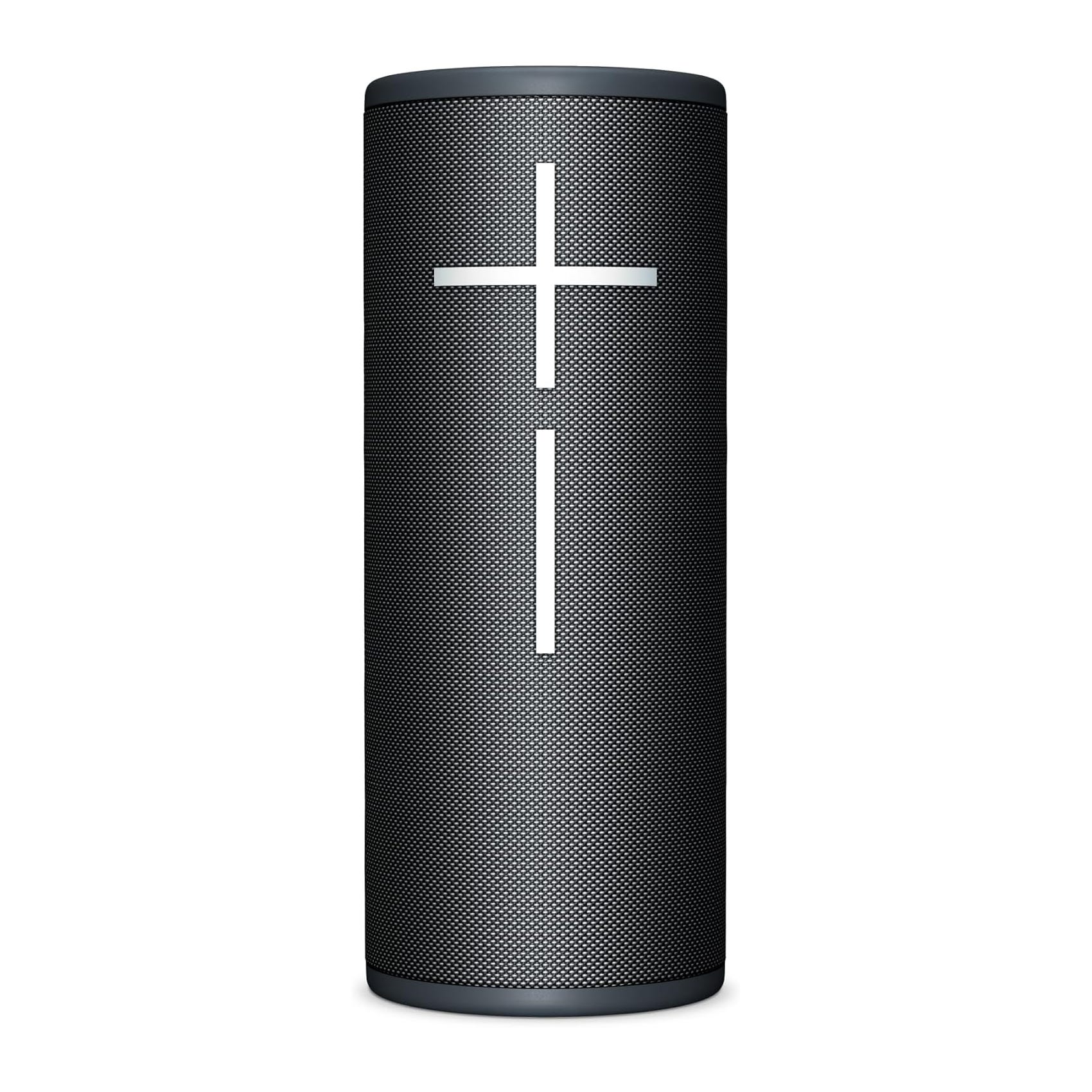 A cylindrical, black Bluetooth speaker with large, vertical \“+\“ and \“−\“ volume buttons on the front, known for 360-degree sound output and water resistance.
