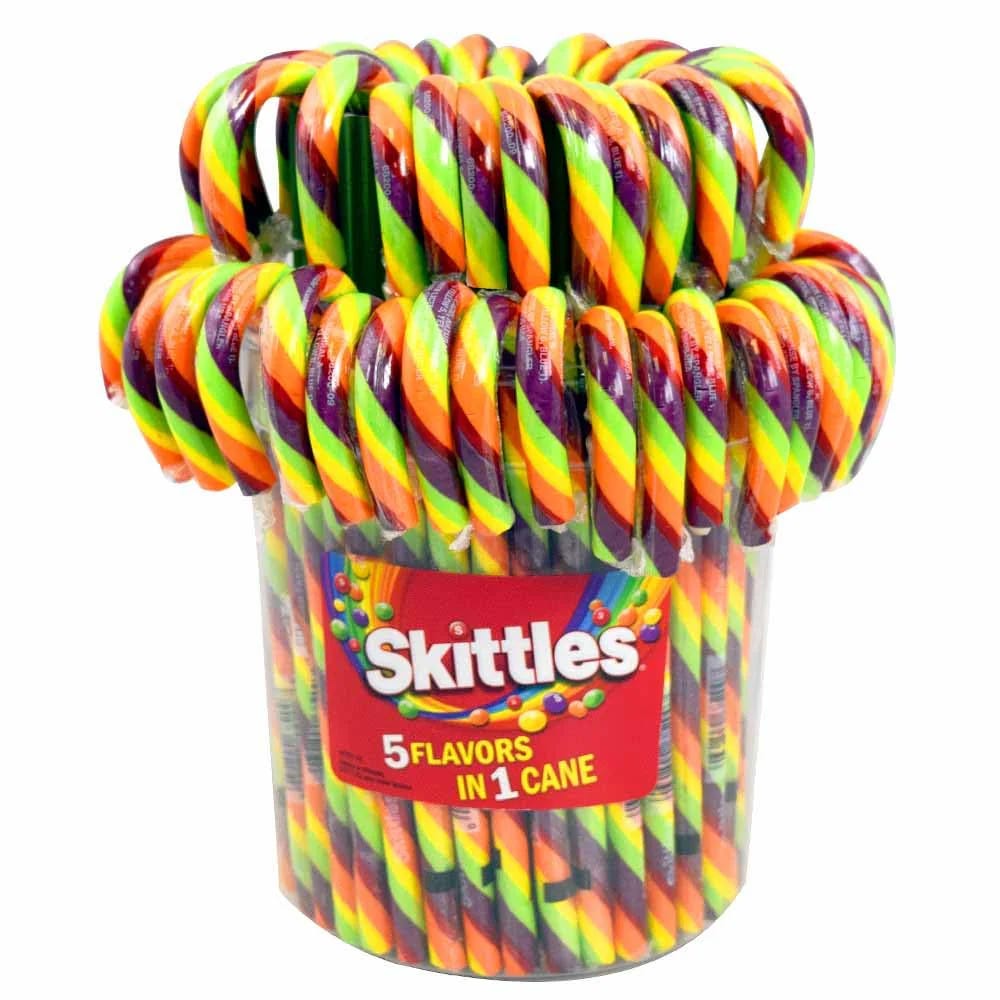 A container of multicolored, twisted candy canes branded with Skittles, featuring five flavors in one cane.