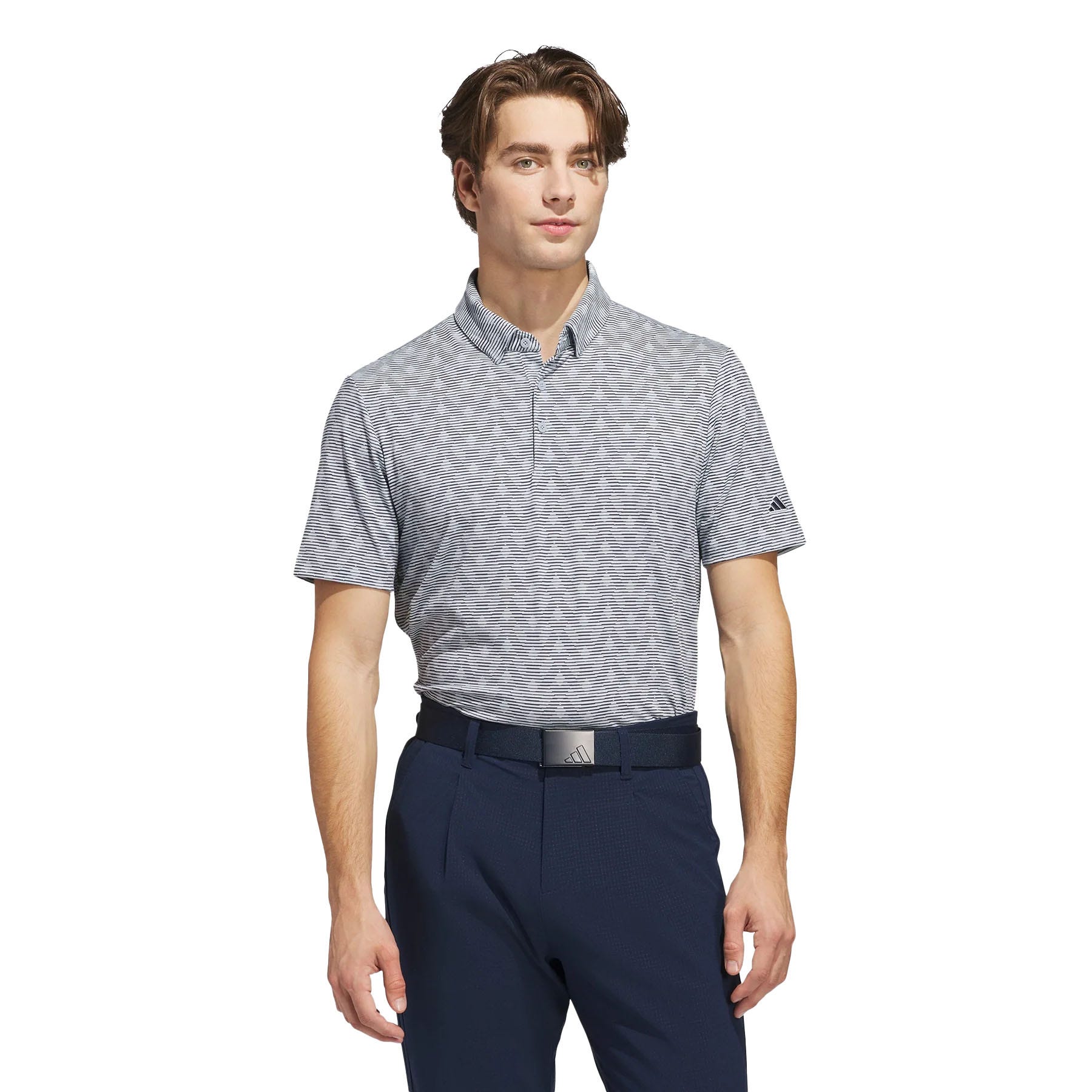 A person is wearing a light grey patterned short-sleeve polo shirt with a small Adidas logo on the sleeve, paired with dark blue pants and a black belt featuring an Adidas buckle.