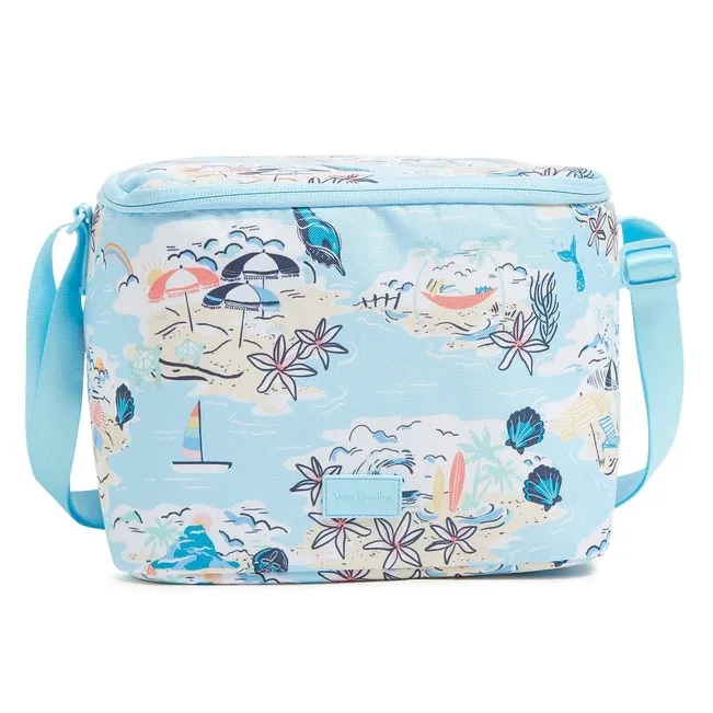 A light blue cosmetic bag with a beach-themed print featuring umbrellas, sailboats, and palm trees.