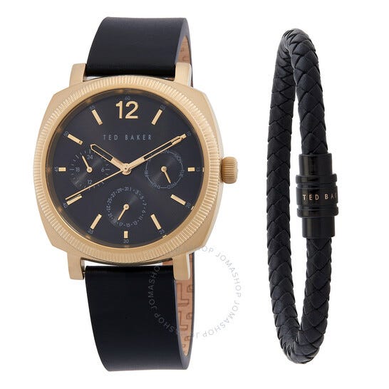 Gold-tone Ted Baker watch with a black leather strap and matching black braided bracelet.