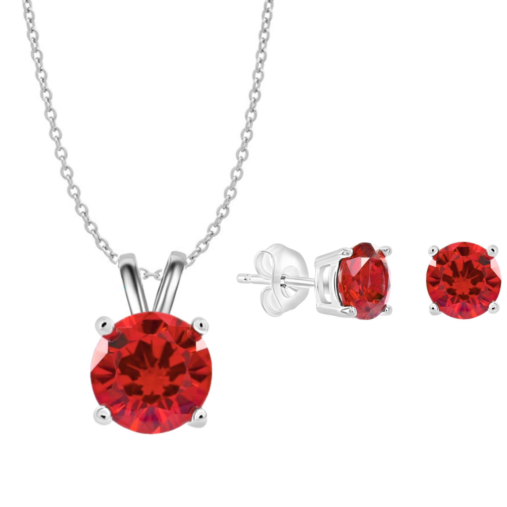 Silver necklace and earring set featuring round, deep red gemstones in a prong setting.
