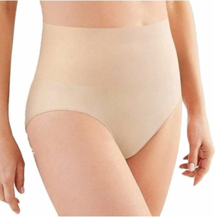 A pair of high-waisted, seamless nude shape-wear panties is shown, designed to smooth the waist and belly area.