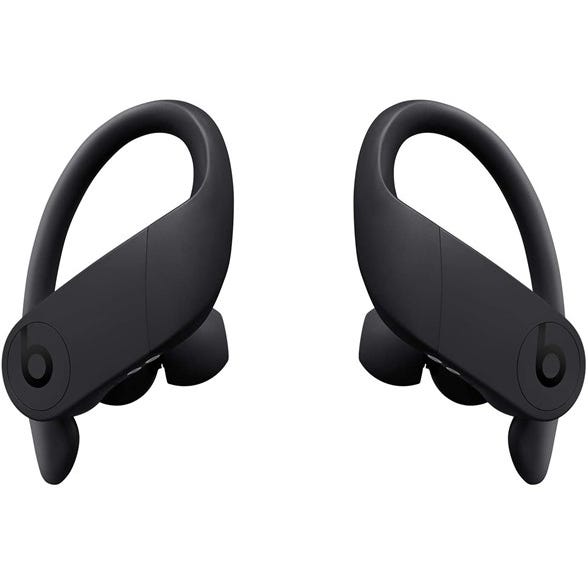 Wireless earbuds with over-ear hooks and the Beats logo, designed for secure and comfortable fit.