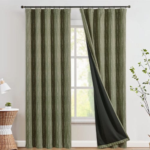These blackout curtain panel 2-packs drop as low as $16.99 during the Memorial Day Sale at Wayfair - and similar packs sell for twice as much elsewhere. A standout pick is this Set of 2 Blackout Boho Moon Phases Curtains which drops from $41.12 to $16.99 in the 84" length. I recently picked up these Faux Linen Textured Thermal 100% Blackout Curtain 2-Pack in beige at $28.99 and was really impressed with the quality for the price. They feel like a much more expensive curtain. Shipping is free when you spend $35, otherwise it adds $4.99.