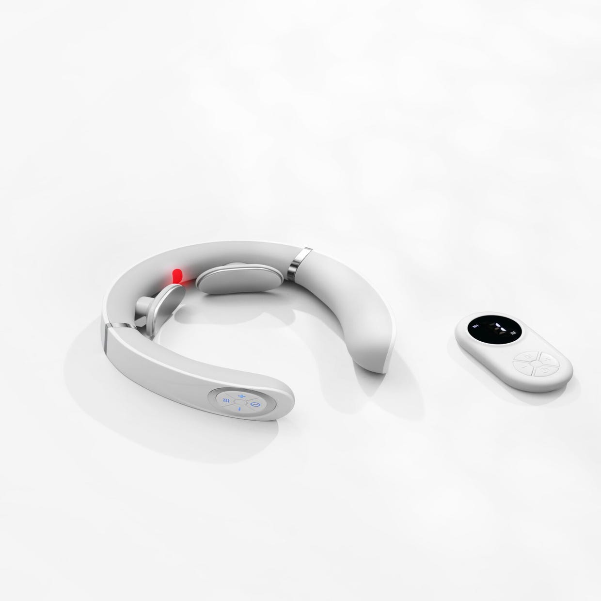 A heated neck massager with an ergonomic, U-shaped design is shown alongside its remote control, both in a minimalist white and silver color scheme.