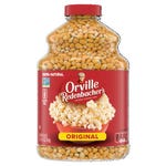 A clear plastic jar filled with yellow popcorn kernels, with a red label featuring the Orville Redenbacher's brand and an image of popped popcorn.