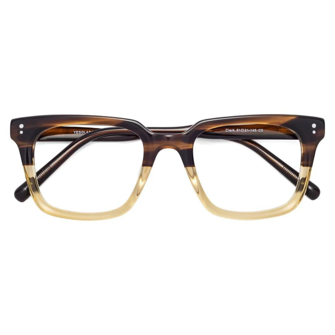 A pair of two-tone rectangular eyeglasses with a dark tortoiseshell upper frame and a clear lower rim.