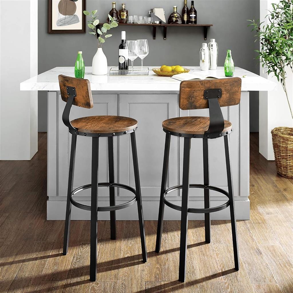 Two industrial-style bar stools with black metal frames and wooden seats and backrests.