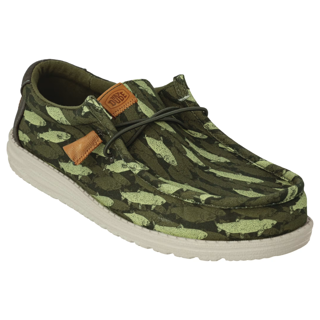 Hey Dude Wally Fish Shoes feature a green camo design with fish graphics, a lightweight sole, and brown leather accents. They have a casual, slip-on style with elastic laces for comfort.