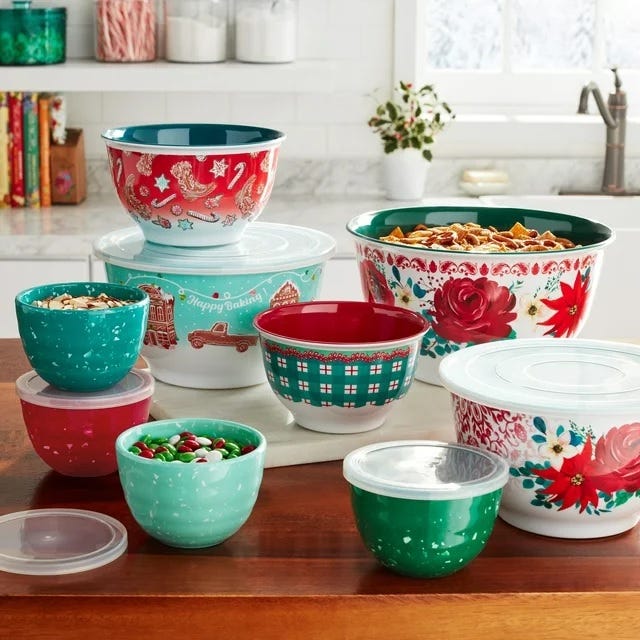 A collection of decorative bowls in various sizes with lids, featuring colorful designs.