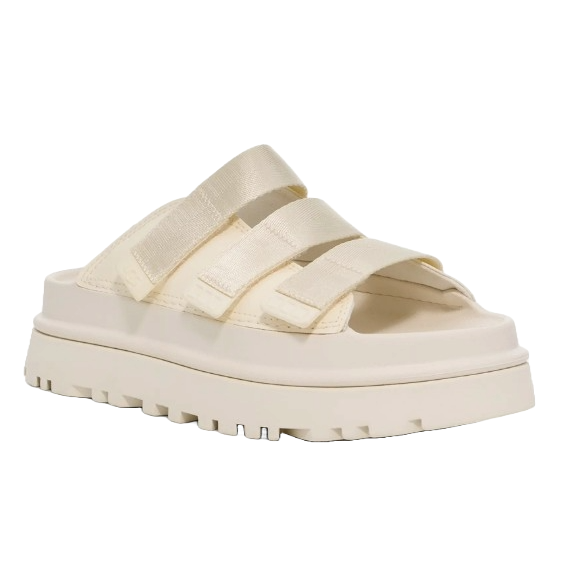 Cream-colored platform sandal with three adjustable straps and a rugged sole.