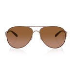 These are Oakley Caveat sunglasses featuring an aviator frame design with a metallic finish and brown tinted lenses.