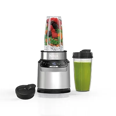 Ninja Nutri-Blender Pro with a digital countdown timer, featuring a blending cup filled with fruits and a to-go cup with a green smoothie.