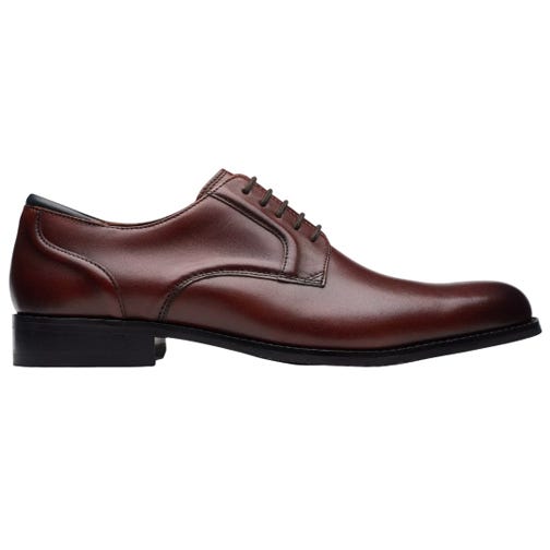 A men's brown leather lace-up dress shoe featuring a sleek design, low block heel, and classic stitching details, ideal for formal occasions.