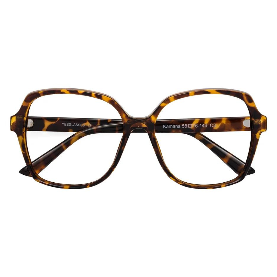 Tortoiseshell-patterned eyeglasses with clear lenses and a cat-eye frame design.