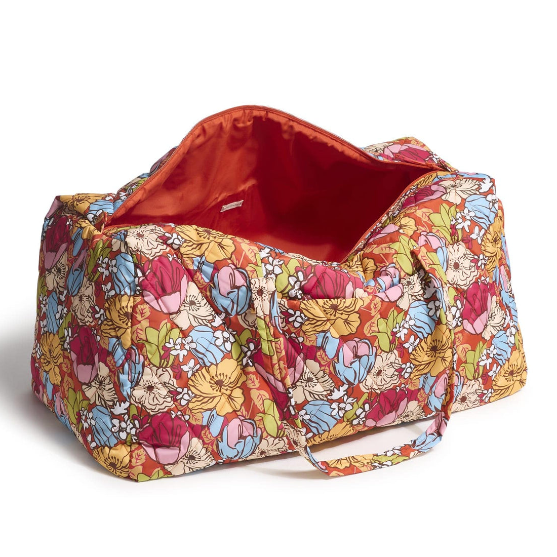 Vera Bradley Outlet XL Duffel features a colorful floral pattern with blue, red, yellow, and green flowers on a quilted fabric. It has dual handles and a spacious red interior for extra storage.