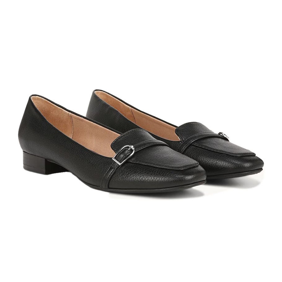 Black Lifestride Catalina Loafers featuring a textured leather finish, low block heel, and decorative strap with buckle detail.