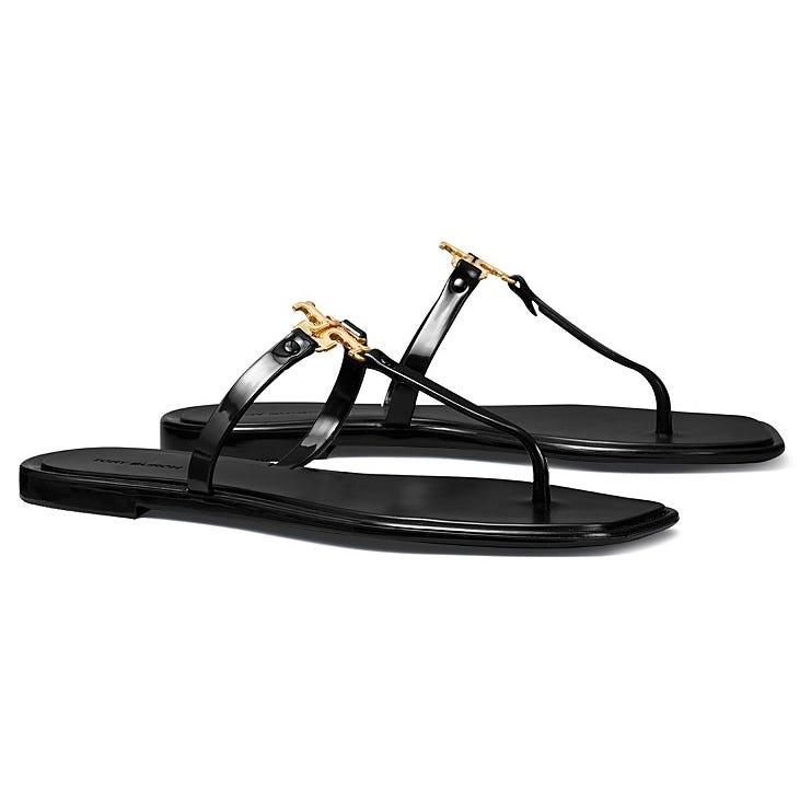 Black thong sandals with gold embellishments on the straps.