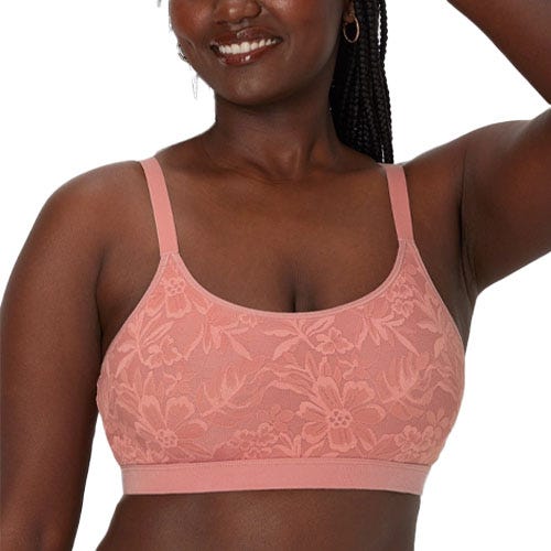 Pink lace-patterned bralette featuring thin adjustable straps and a wide elastic band for comfort.
