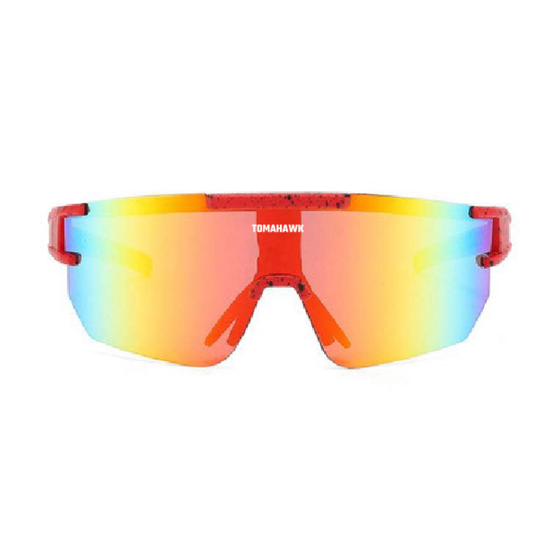 Tomahawk's The Long-Goners sunglasses feature a single, wide lens with a rainbow gradient and red speckled frame. The design is sporty and modern, suitable for fashion-forward individuals seeking eye protection with a vibrant style.