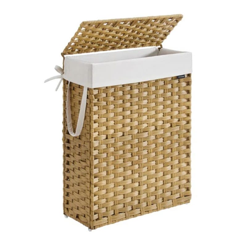A wicker laundry hamper with a flip-top lid and side handles.