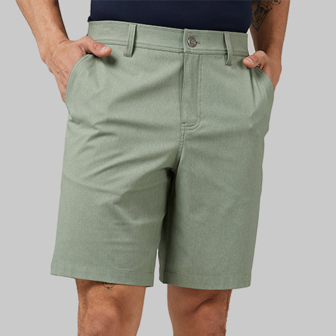 A pair of green men's chino shorts.