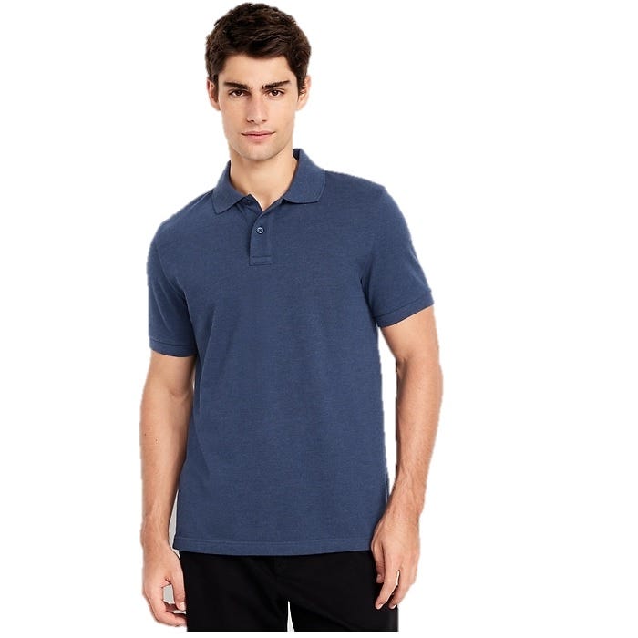A man wears a short-sleeve, dark blue polo shirt paired with black pants.