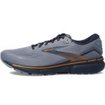 Men's blue-gray running shoe with orange accents.