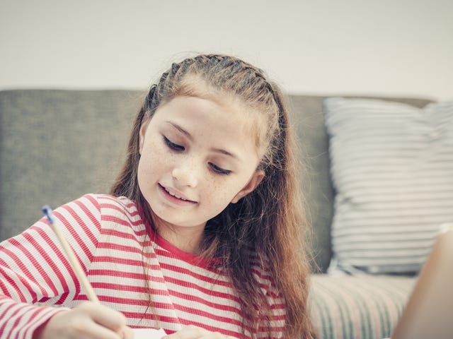 young girl studying english