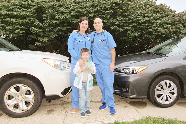 John Zdanowicz and Julia Zdanowicz and their son.