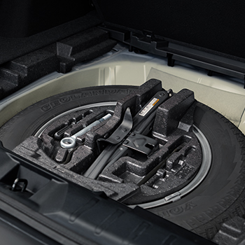 The full-size spare tire sits nicely in the cargo area.