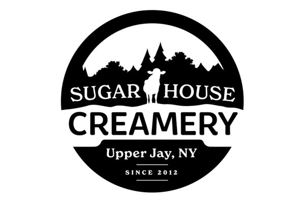 The Sugar House Creamery logo, which has a cow and trees silhouetted in a circle and says, Sugar House Creamery, Upper Jay, NY, since 2012.