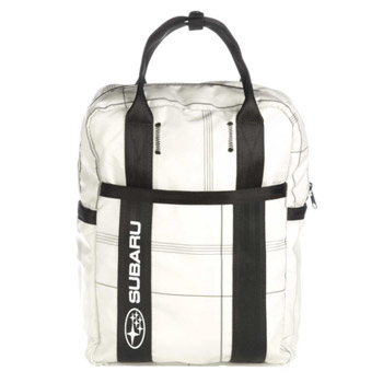 The Rewilder Backpack in white with black straps. A white-colored Subaru logo is clearly visible on the bottom half of one black strap.