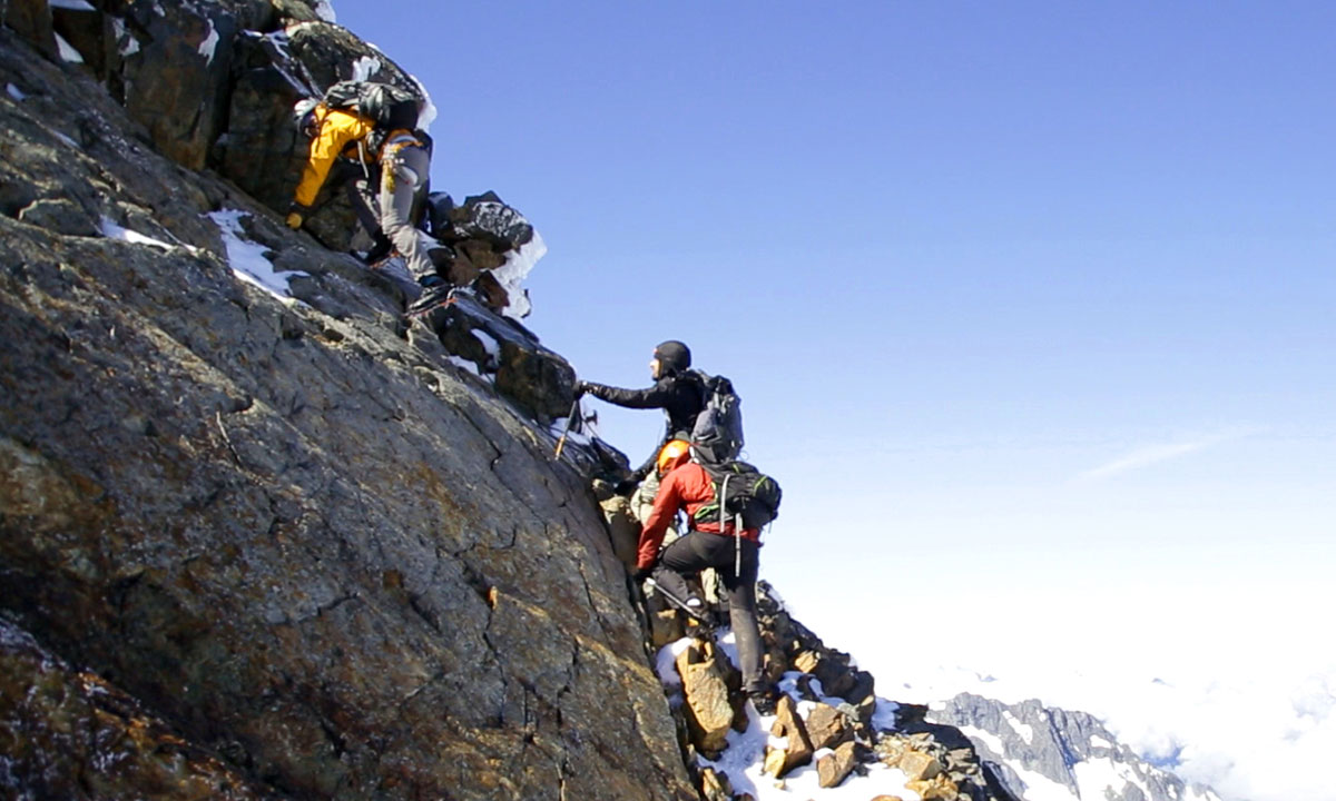 Smith, Steward and crew scale Sahale Mountain.