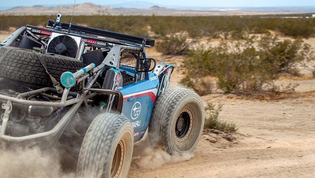 A Subaru-powered desert racing buggy on a sandy trail in Mexico