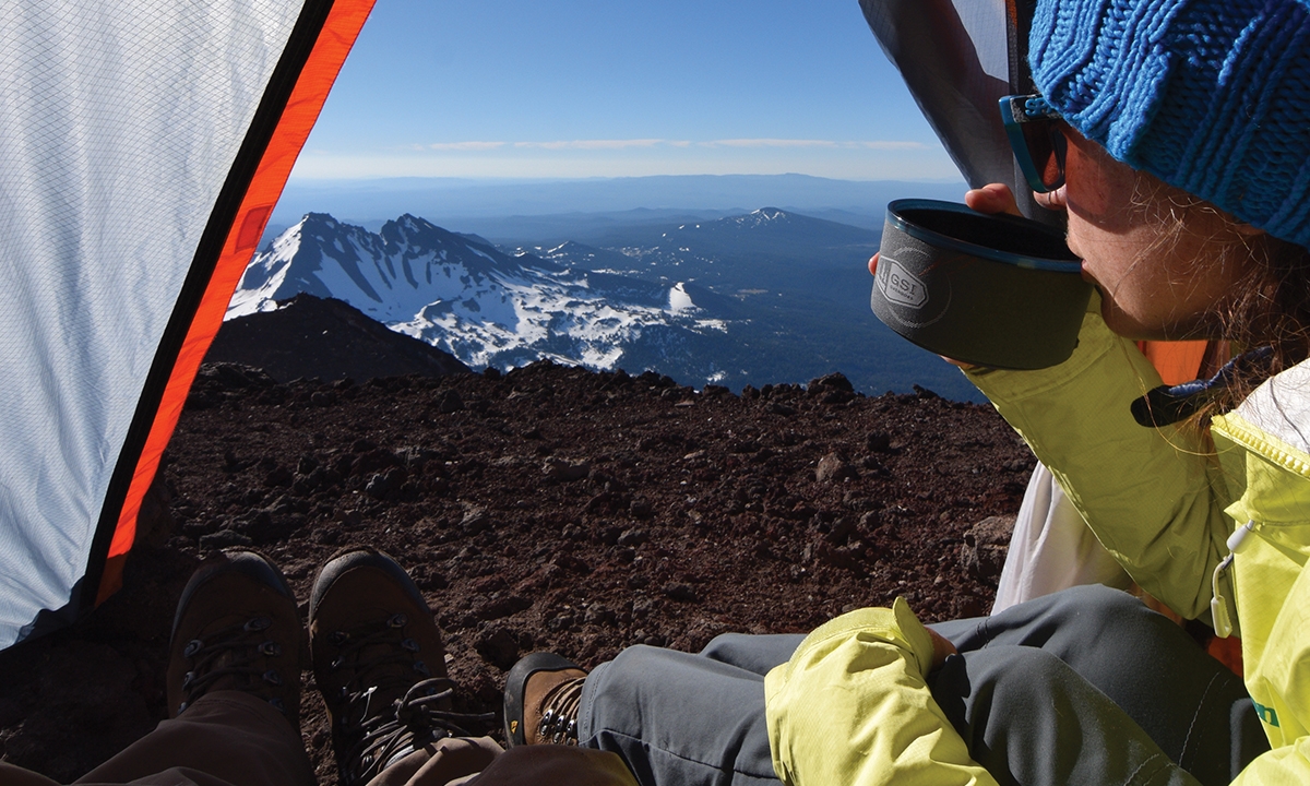The Garlows enjoy a peaceful moment at South Sister Volcano.
