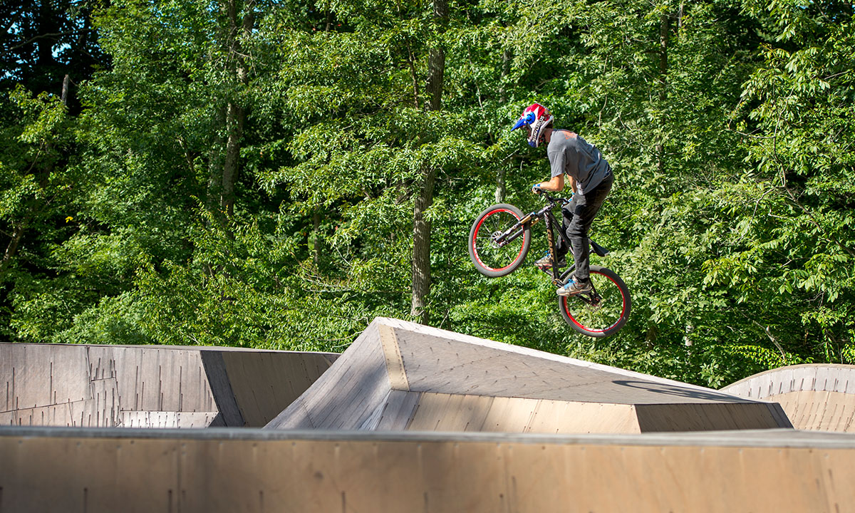 Travis Pastrana practices on one of the many BMX ramps at Pastranaland.