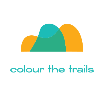 The Colour the Trails logo featuring the organization name with overlapping mountain illustrations.