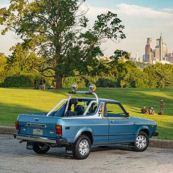 KC Hilites, roll bar and rear seats on a 1980 Subaru BRAT